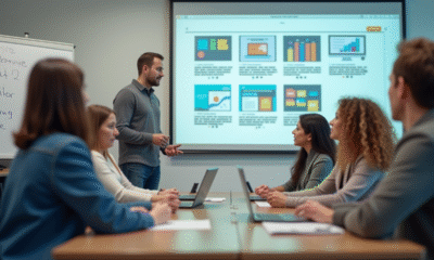 Groupe d'apprenants en formation numérique dans une salle lumineuse